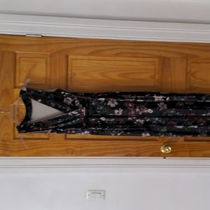 Black Floral Velvet Like Material Romper Size Small from Spain